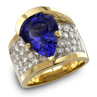 Gold ring with blue sapphire and white diamonds